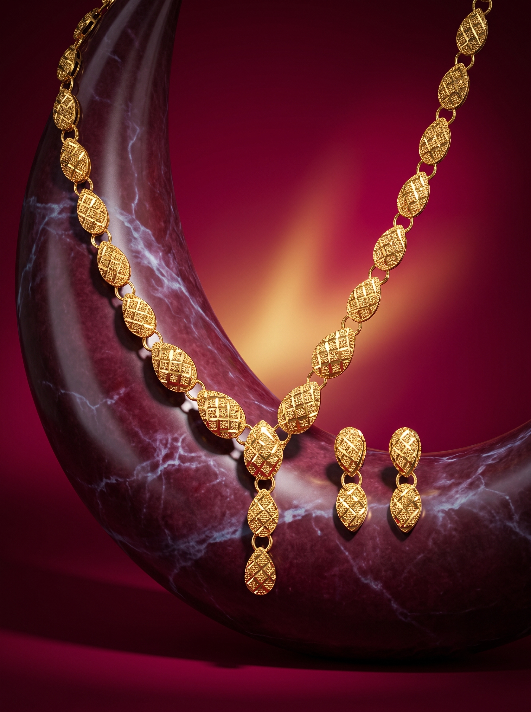 Geometric Leaf Motif Gold Necklace and Drop Earrings Set